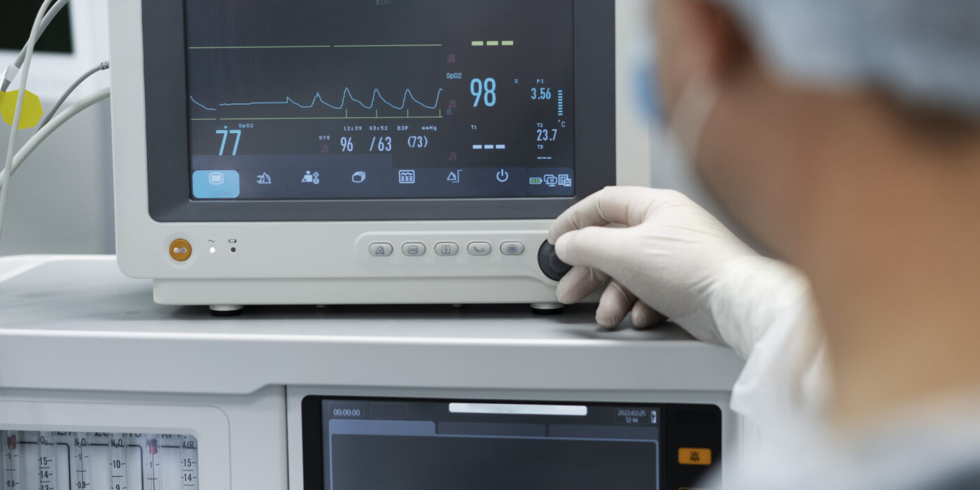 doctor-monitoring-patient-s-pulse